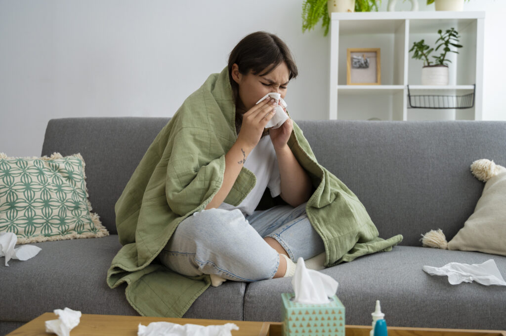 femme qui a des problèmes de respiration